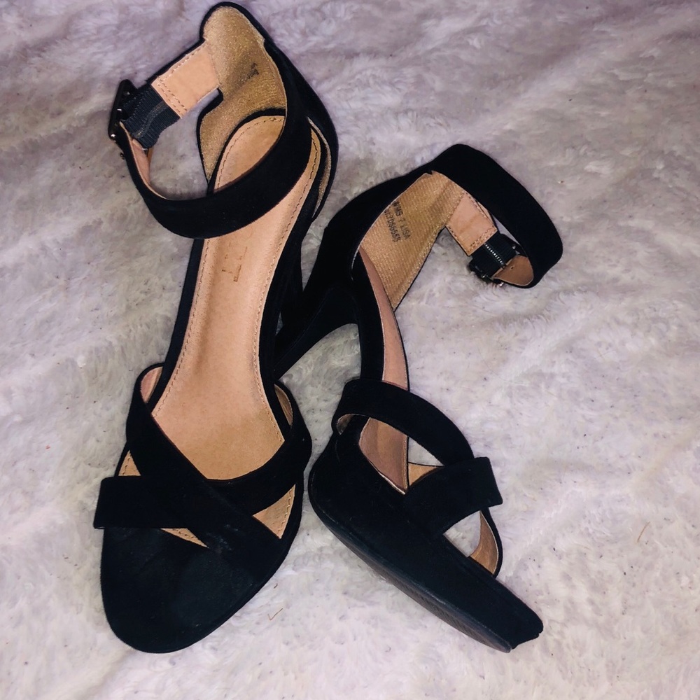 Black straps heels.